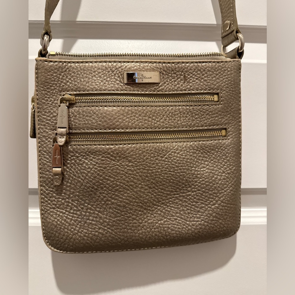 Cole Haan gold pebbled leather cross body bag